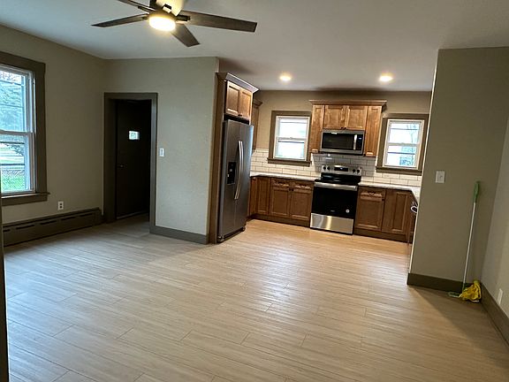Kitchen from front hallway looking towards side door