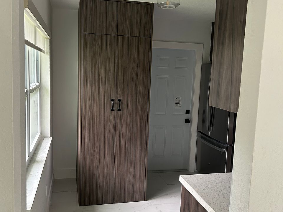 View of concealed laundry cabinet