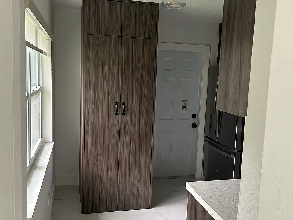 View of concealed laundry cabinet