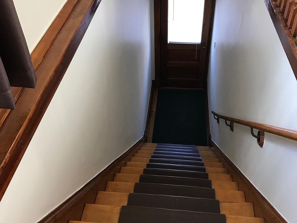 Front entrance and stairwell.