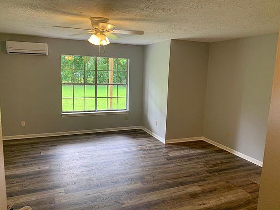 large living room with porch and French doors now to back yard