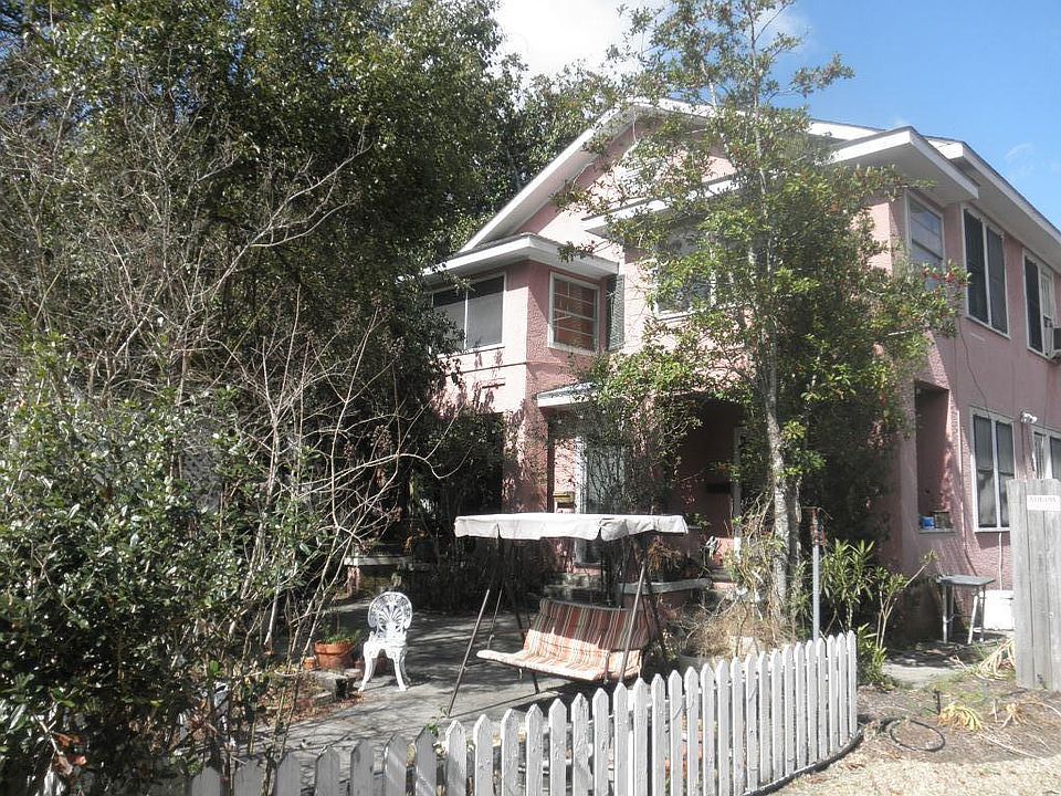 Front view with courtyard in foreground.