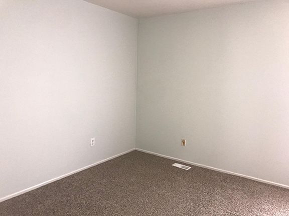 fresh new paint & carpeting throughout , master bedroom shown here