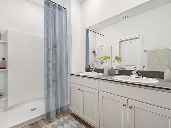 Casey Key new construction home plan owner s bathroom at Lanier Acres in Zephyrhills, FL by William