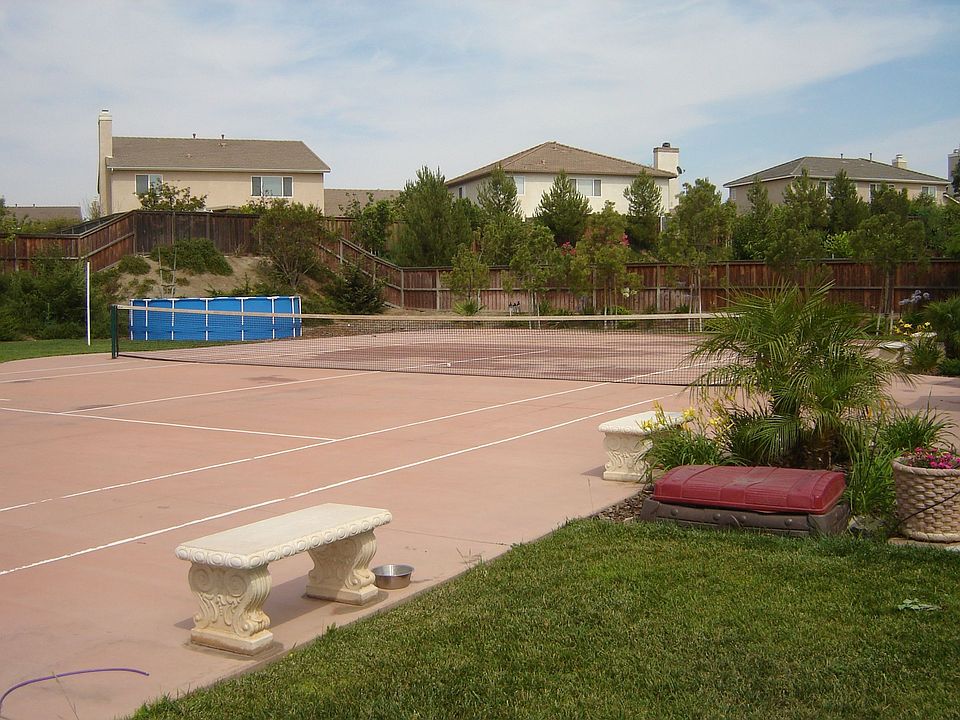 Tennis court in backyard