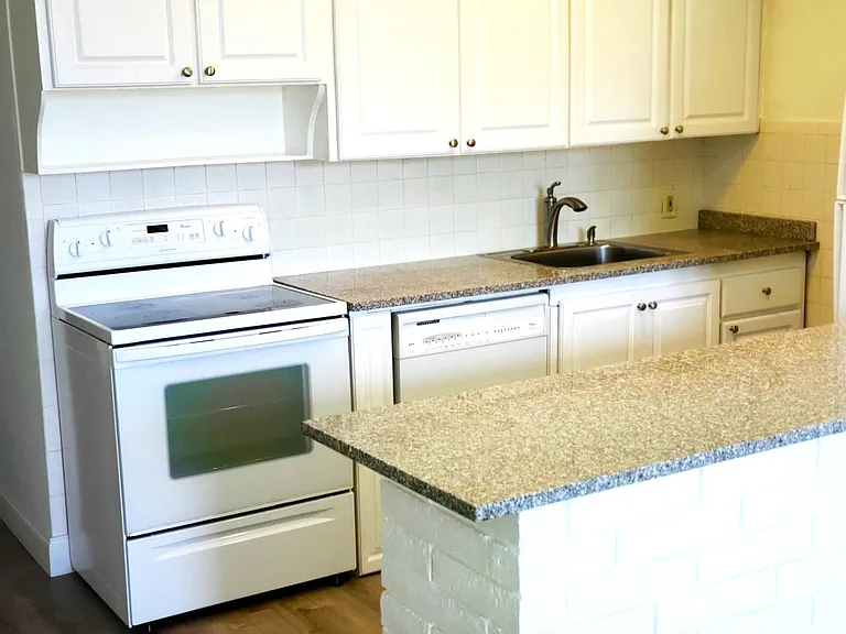 Galley kitchen, granite counters