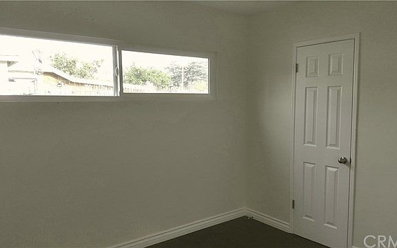 guest/ kids bedroom with a good size closet and brand new floors and windows
