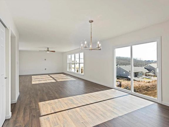 Living room and breakfast area view straight up from kitchen