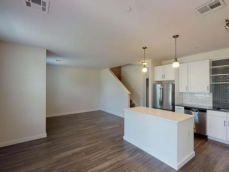 Classic charm. Modern Life. It's all in the details _ from white shaker cabinetry and quartz countertops to large windows and moveable chef's islands