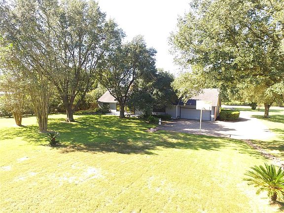 The home offers an over-sized 2 car attached garage with a shop area and an extra side garage door on the side. So much space for family play!