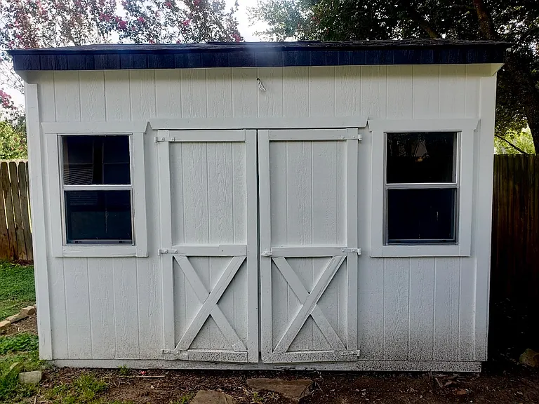 10x12 shed (120 square feet) in backyard.