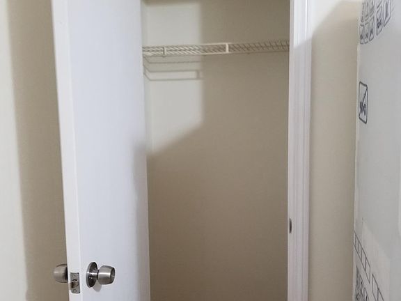 Coat closet in kitchen