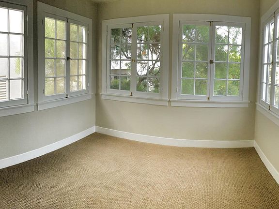 Bonus sunroom ideal for a home office, reading nook, or creative space.