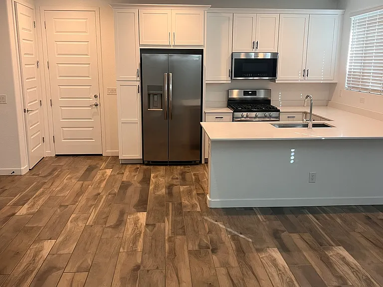 11163 W Luxton Ln — Photo 2