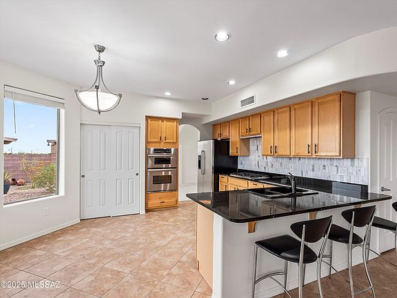 4th image of 4864 N Louis River Way
