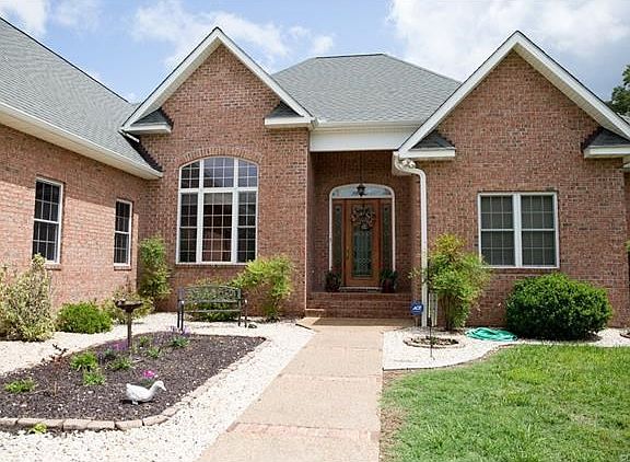 Beautiful walkway. Elegantly landscaped for low maintenance.
