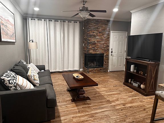 Living room to covered balcony.