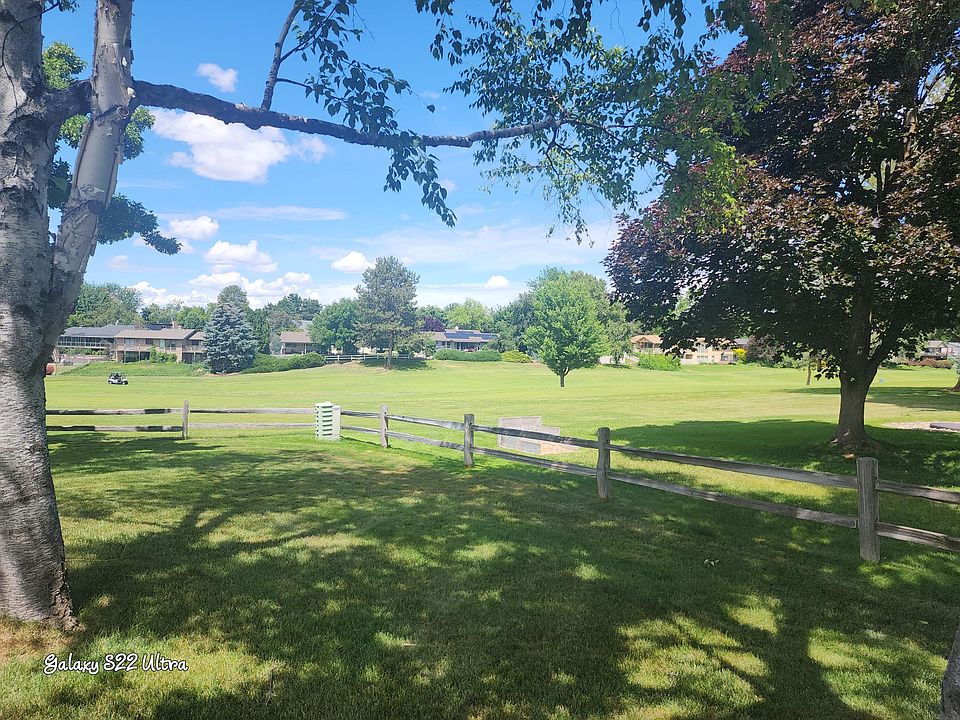 Front of property to the left is the 6th hole on the eagle golf course. Left sude of garage leading to the back of the property.