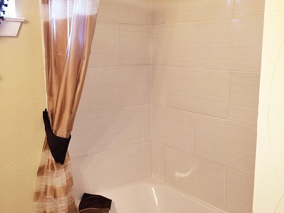 Cool tile surround- new tub