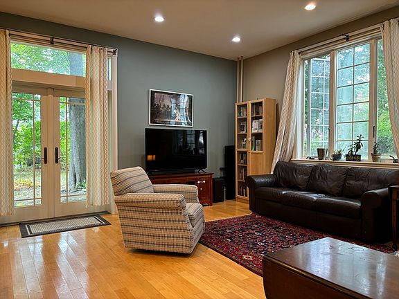 Living room with glass doors to private patio