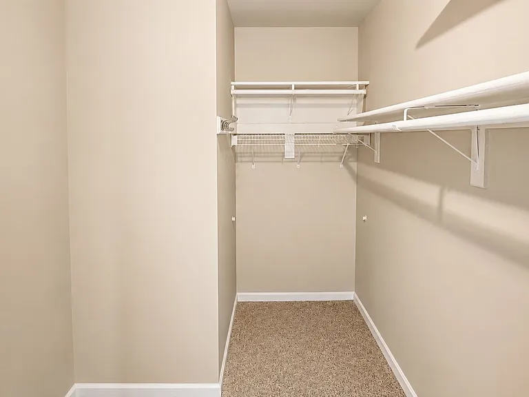 30 - Primary bedroom walk-in closet view_07152026