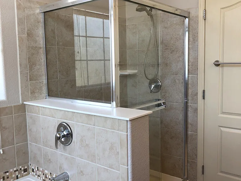 Soaker tub and shower in primary attached bathroom.