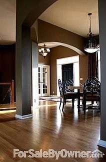 Front Entry & Dining Room
						:
						Arched walkway and double pillars
