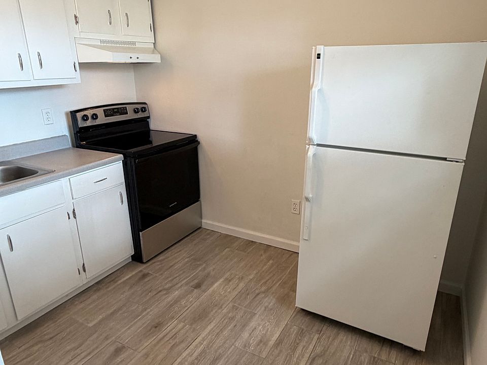 Kitchen with refrigerator