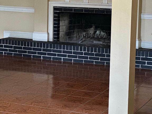 Cozy Fireplace in family room off kitchen