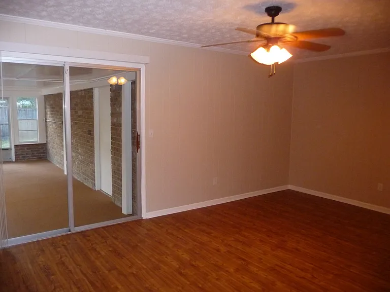 Family room and sliding door to sun room