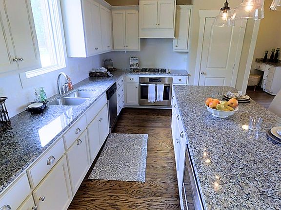 Previously built home based on this plan. Photos not of current home. Upgrades may be pictured.