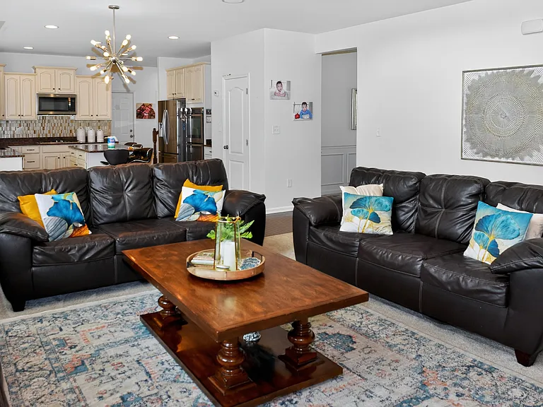 Livingroom _ Shown furnished. If a furnished rental arrangement is agreed upon, the room would be presented as shown.