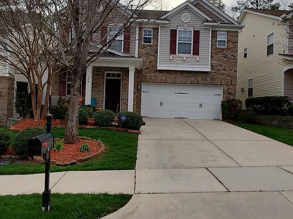 Nicely maintained Front Yard with fragrant Roses, Tulips, and Lilies