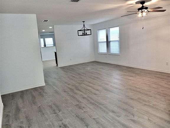 Living room with entry to Kitchen Area