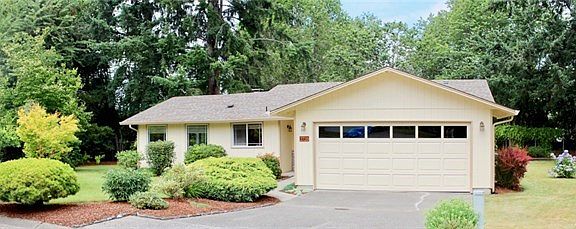 Beautifully landscaped with private rear yard.  Vinyl windows, updated kitchen and baths, AC and more!!