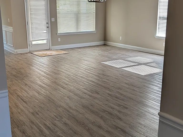 Great room open floor plan opens to covered back patio