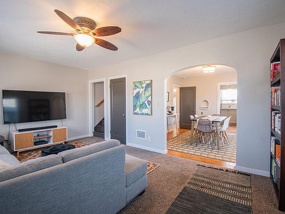 Living room, coat closet, entrance to dining room