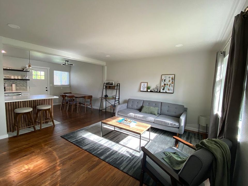 Open concept living room, dining and kitchen