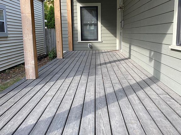 Long front porch for privacy and no loss of mail.