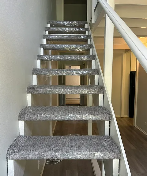 Staircase to loft. Carpet on stairs and upstairs is brand new.