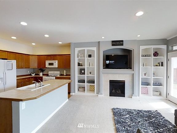 Kitchen and family room
*Updated with hard surface flooring throughout
*Updated with cellular blinds