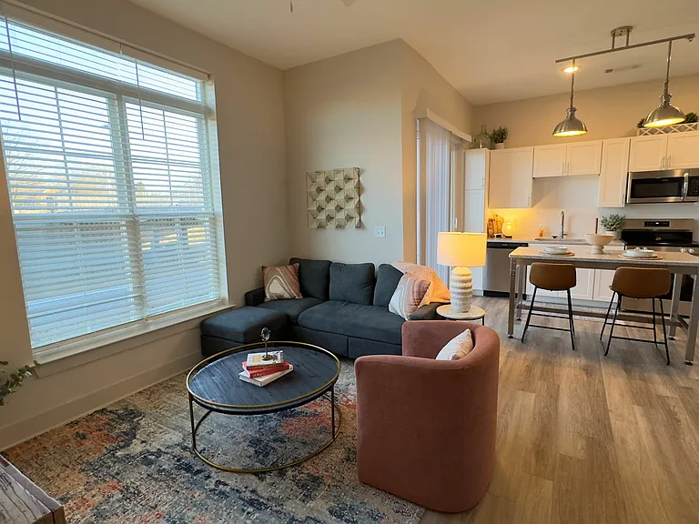 Experience the warmth and elegance of this beautifully designed open-concept living area.