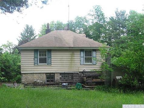 Back of house where cement deck is
