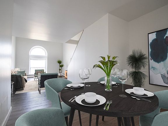 Step into the allure of this timeless apartment building, where a spacious dining room awaits