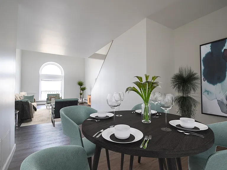 Step into the allure of this timeless apartment building, where a spacious dining room awaits