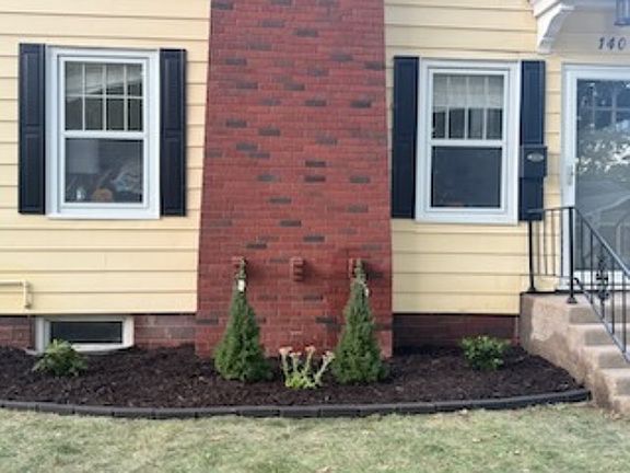 Attractive large yard with new landscaping