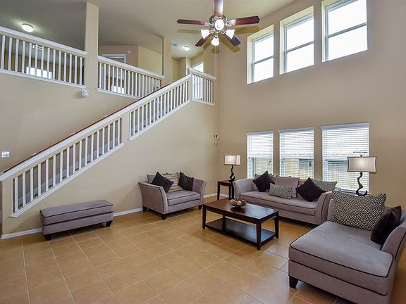 Family Room.Tiled from kitchen to family room. Amazing natural Lighting!