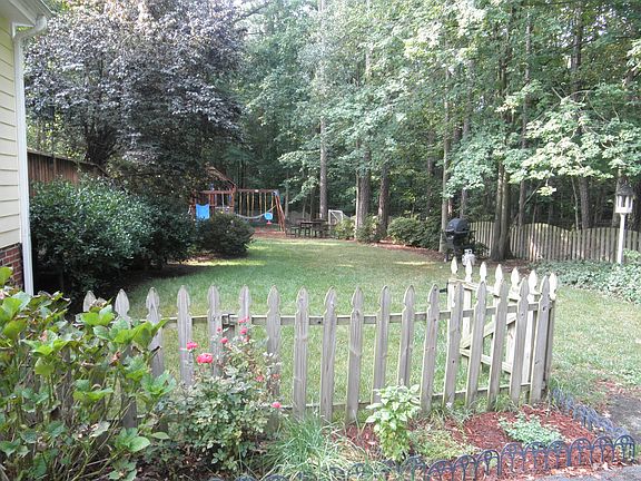 Backyard, swingset in back