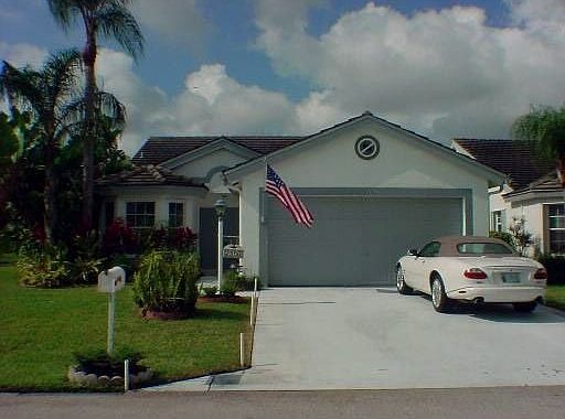 Front view and 2 car garage