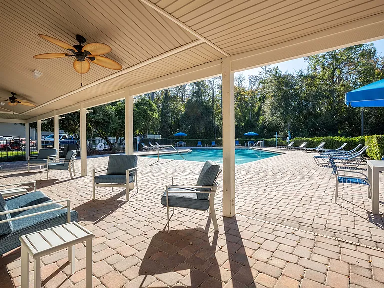 Relax in style at this elegant poolside lounge, perfect for unwinding and enjoying the sun.